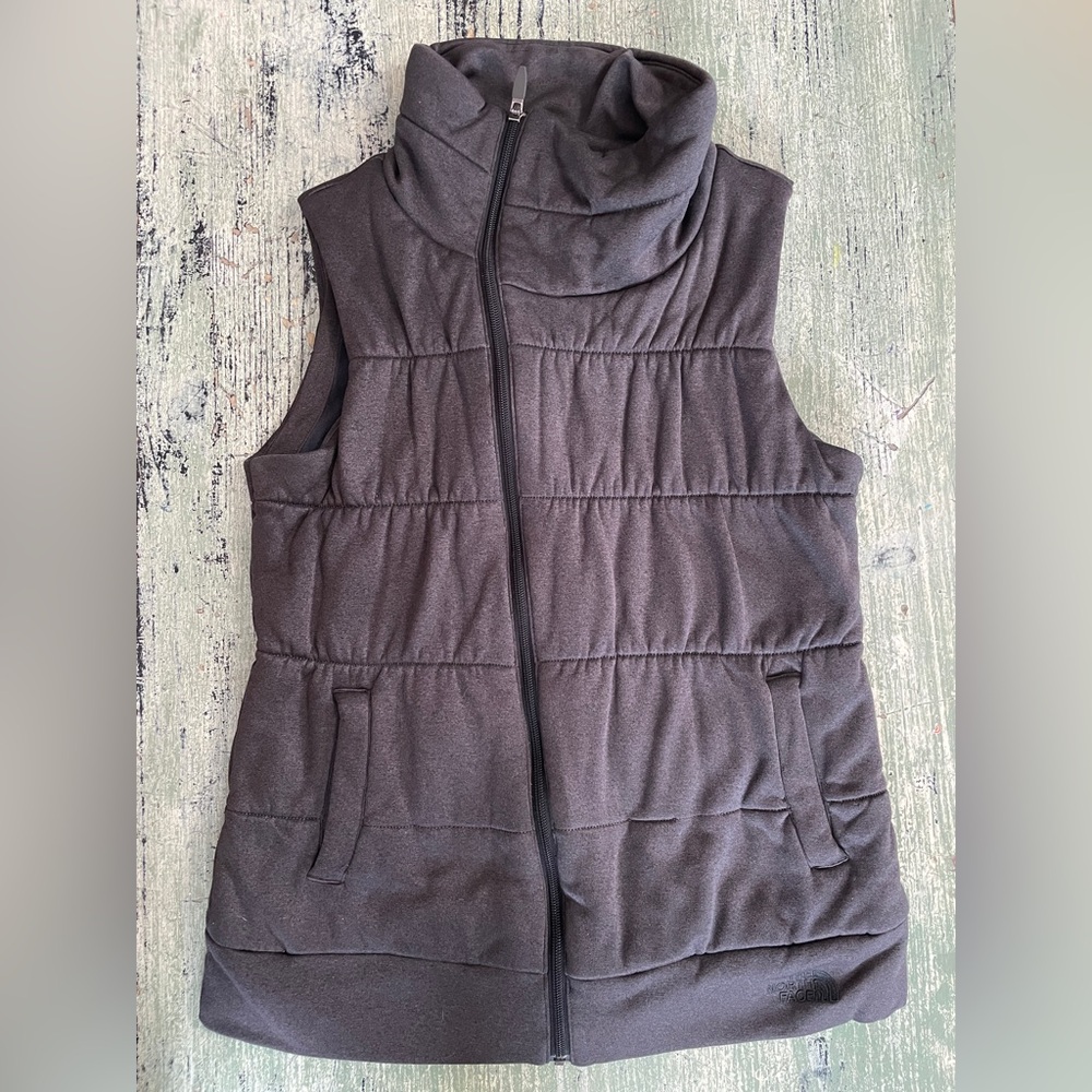 North Face Woman’s grey cross zip vest. Sz M